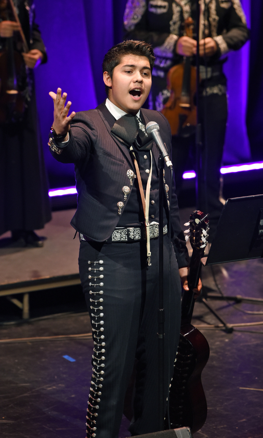 Mariachi student singing at concert